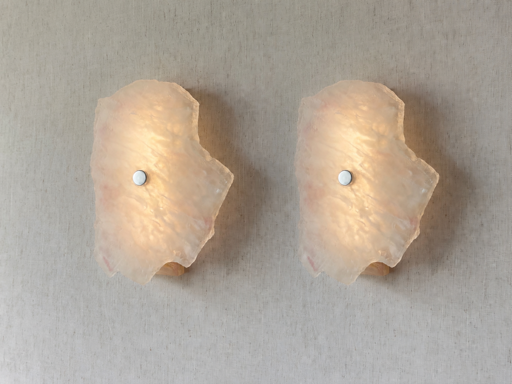 Wireless resin wall sconce with white quartz-inspired finish