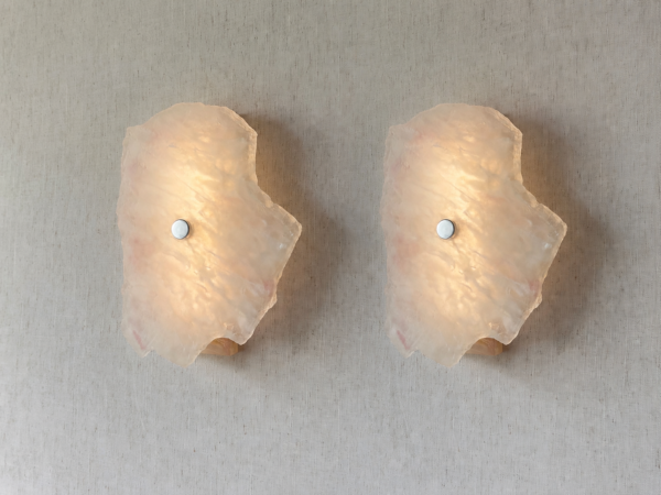 Wireless resin wall sconce with white quartz-inspired finish