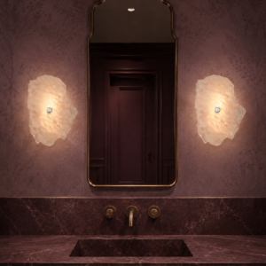 Wireless resin wall sconce with white quartz-inspired finish
