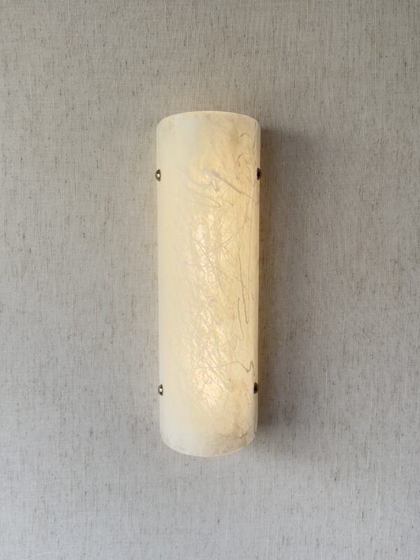 Wireless resin wall sconce with white quartz-inspired finish