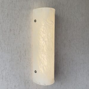 Wireless resin wall sconce with white quartz-inspired finish