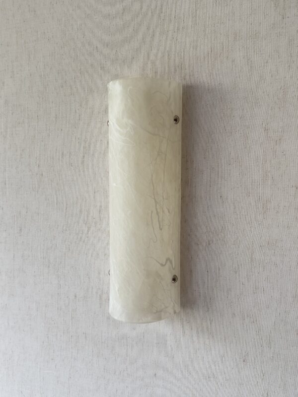 Wireless resin wall sconce with white quartz-inspired finish