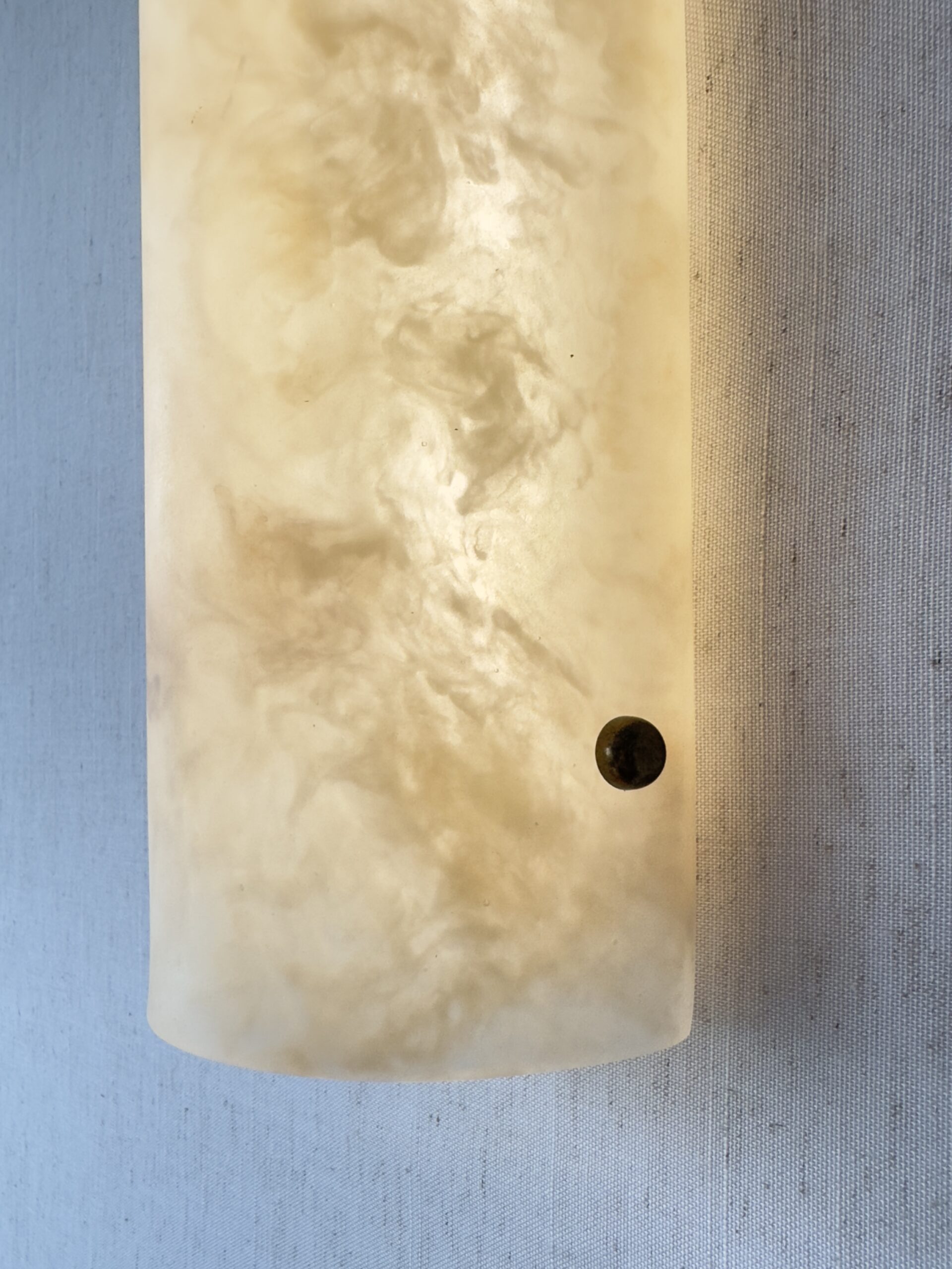 Handmade wireless resin wall sconce with alabaster-inspired finish