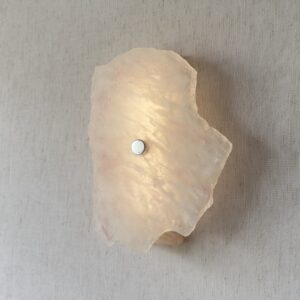 Wireless resin wall sconce with white quartz-inspired finish