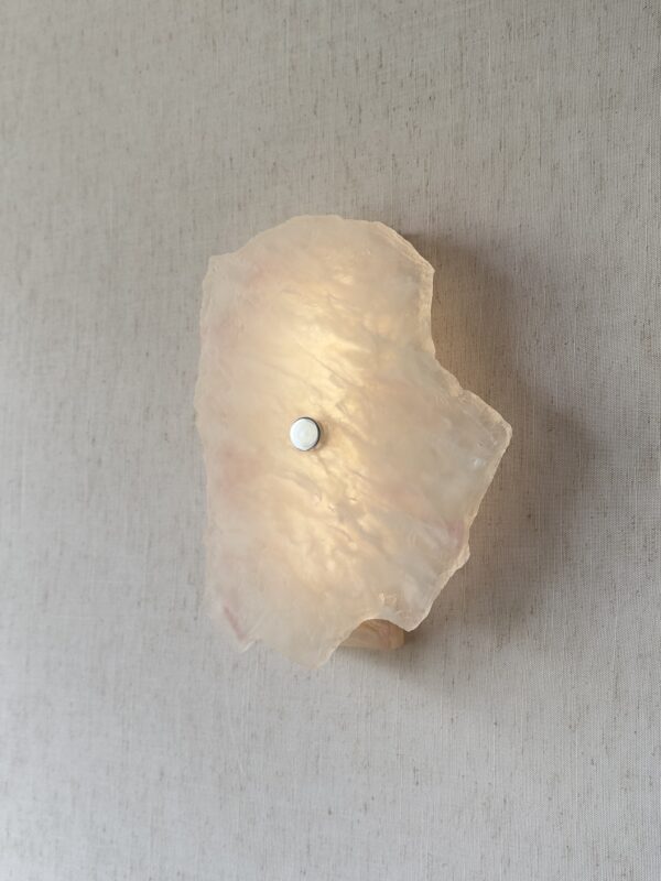 Wireless resin wall sconce with white quartz-inspired finish