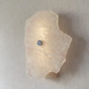 Wireless resin wall sconce with white quartz-inspired finish