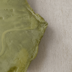 Wireless resin wall sconce inspired by green onyx stone