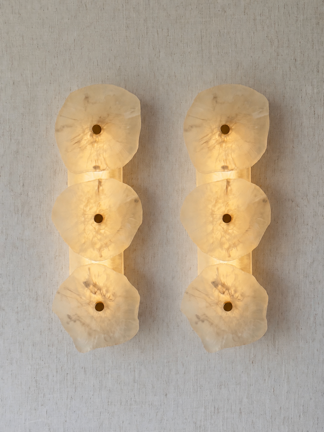 Handmade wireless resin wall sconce with alabaster-inspired finish