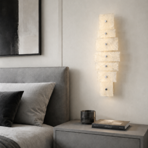 Wireless resin wall sconce with white quartz-inspired finish