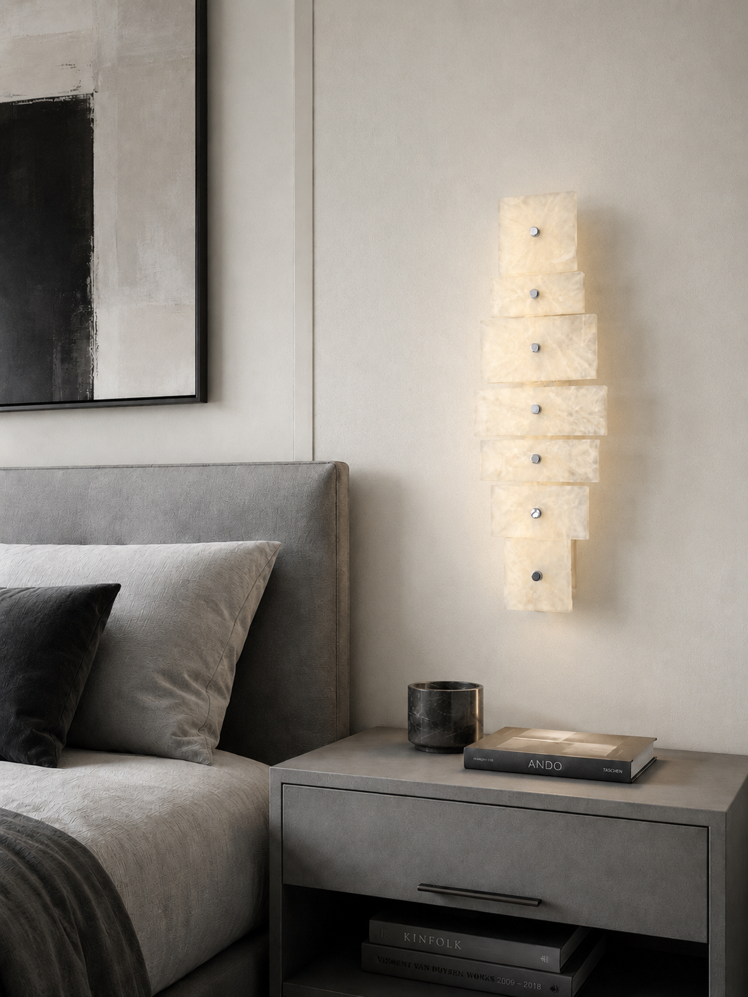 Wireless resin wall sconce with white quartz-inspired finish