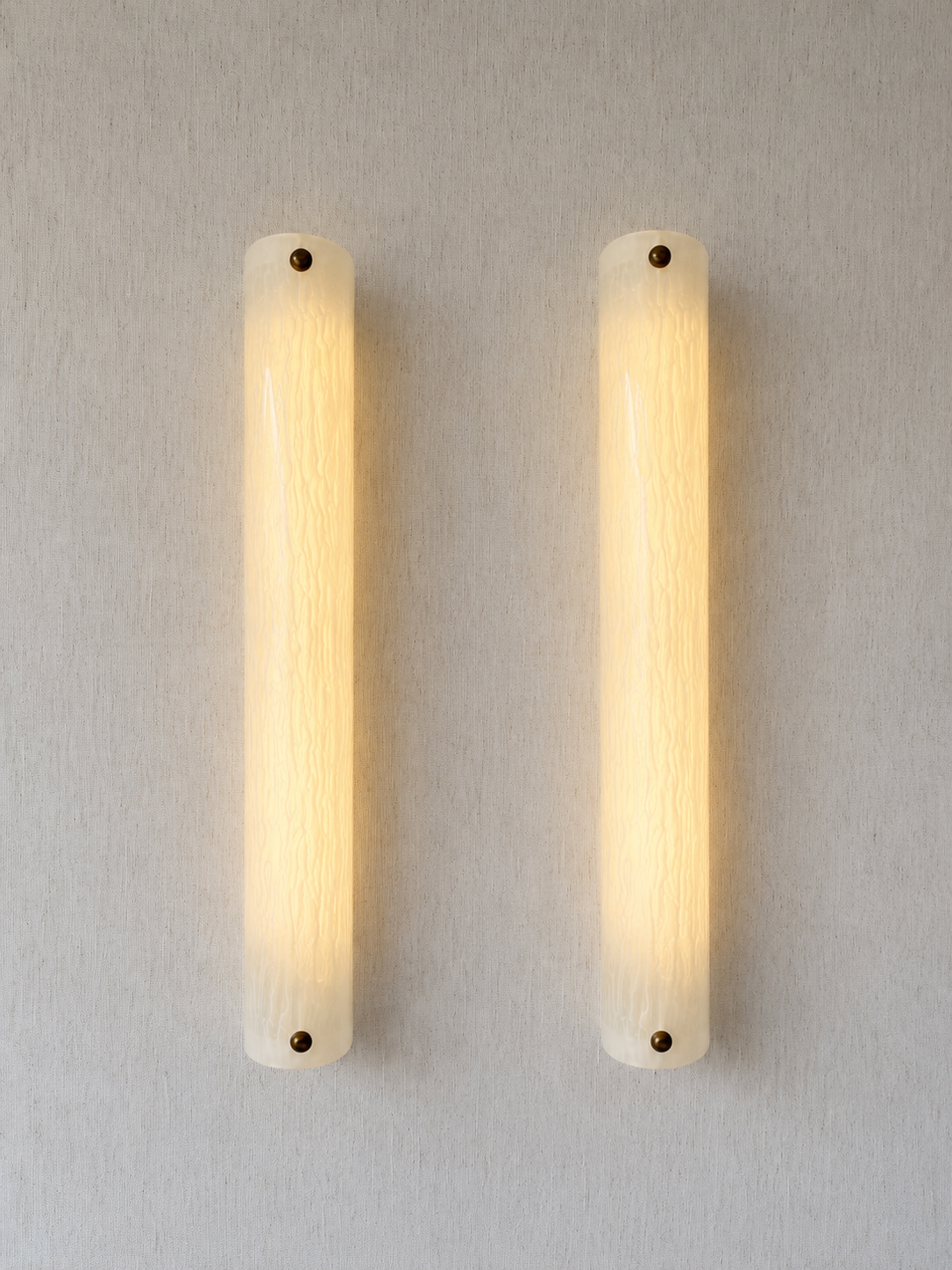 Large vertical wireless resin wall light with sculptural form