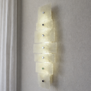 Wireless resin wall sconce with white quartz-inspired finish