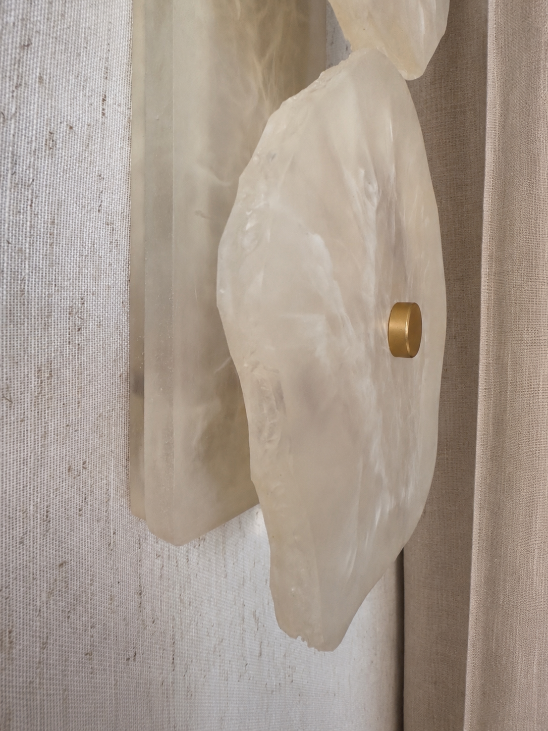 Handmade wireless resin wall sconce with alabaster-inspired finish