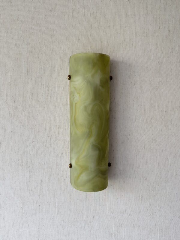 Wireless resin wall sconce inspired by green onyx stone