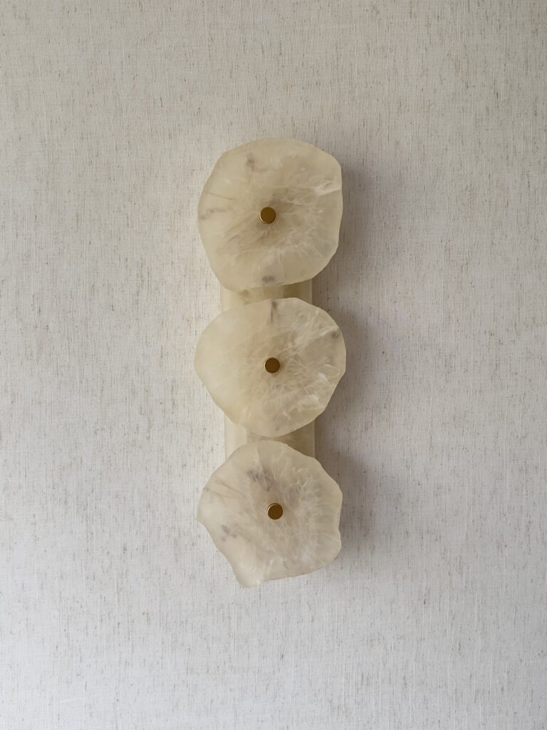 Handmade wireless resin wall sconce with alabaster-inspired finish