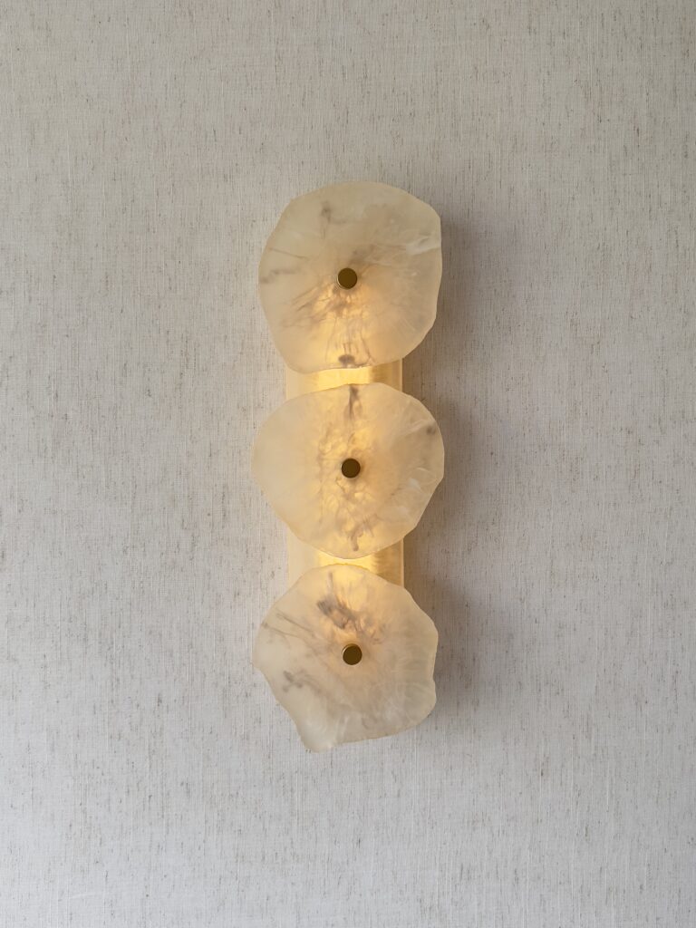 Handmade wireless resin wall sconce with alabaster-inspired finish