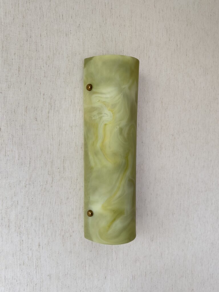 Wireless resin wall sconce inspired by green onyx stone
