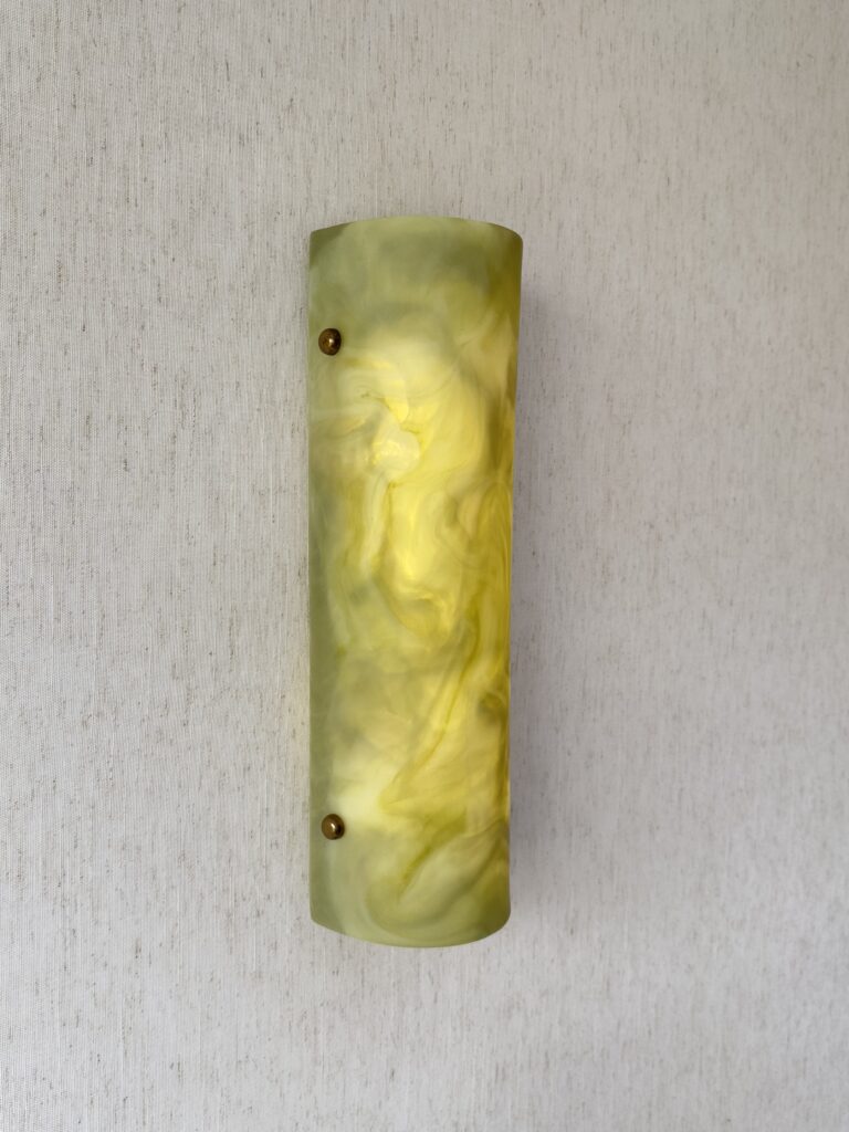 Wireless resin wall sconce inspired by green onyx stone