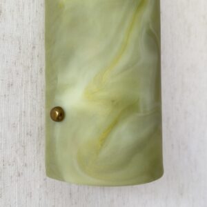 Wireless resin wall sconce inspired by green onyx stone