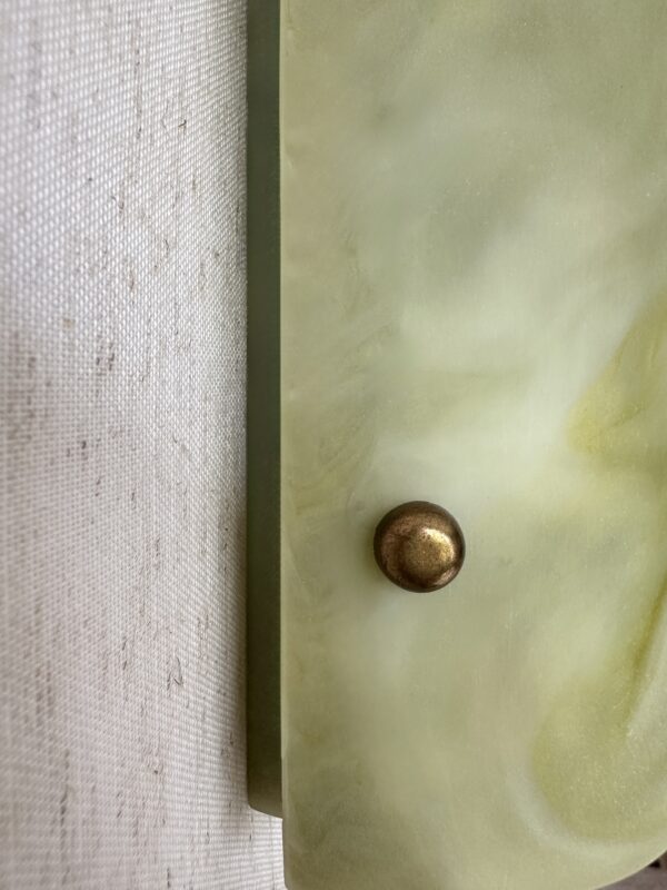 Wireless resin wall sconce inspired by green onyx stone