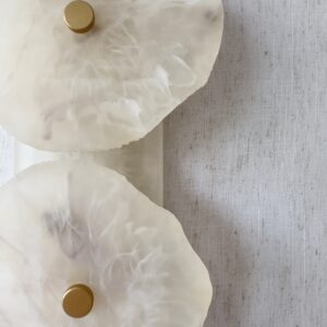 Handmade wireless resin wall sconce with alabaster-inspired finish