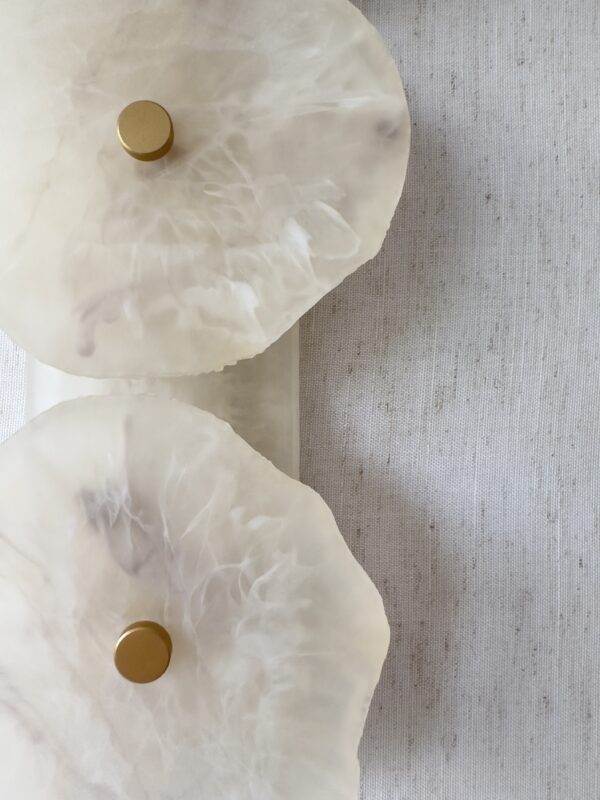 Handmade wireless resin wall sconce with alabaster-inspired finish