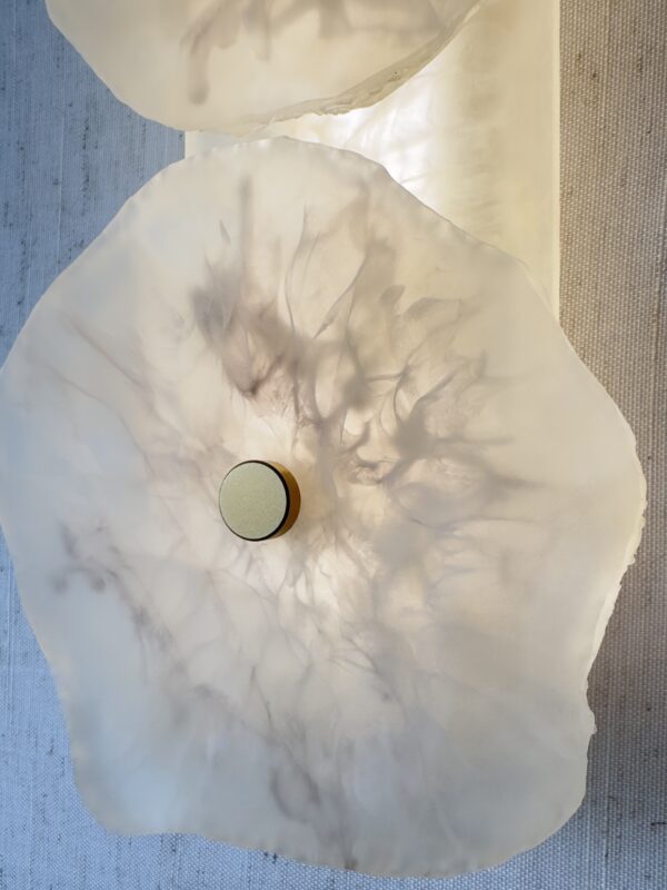 Handmade wireless resin wall sconce with alabaster-inspired finish