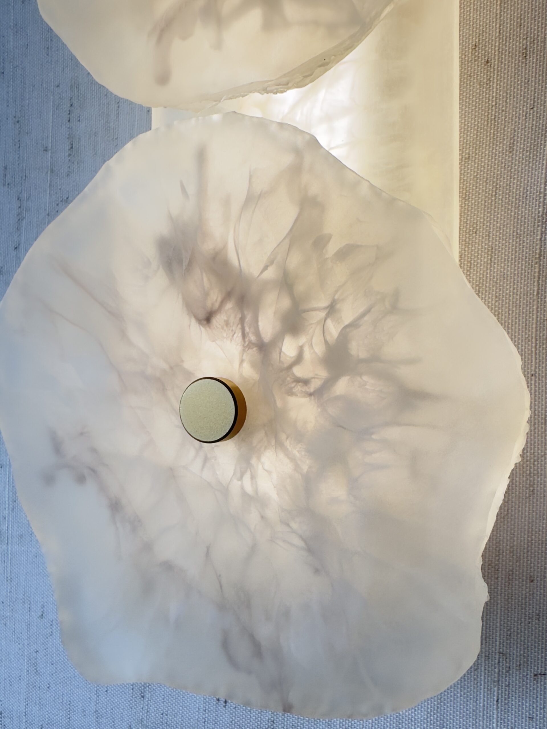 Handmade wireless resin wall sconce with alabaster-inspired finish
