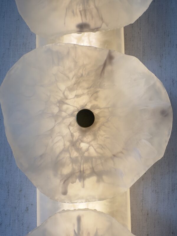 Handmade wireless resin wall sconce with alabaster-inspired finish