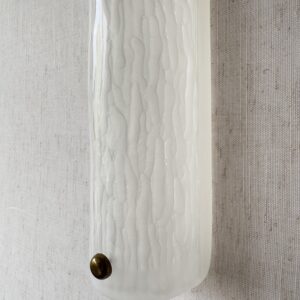 Large vertical wireless resin wall light with sculptural form