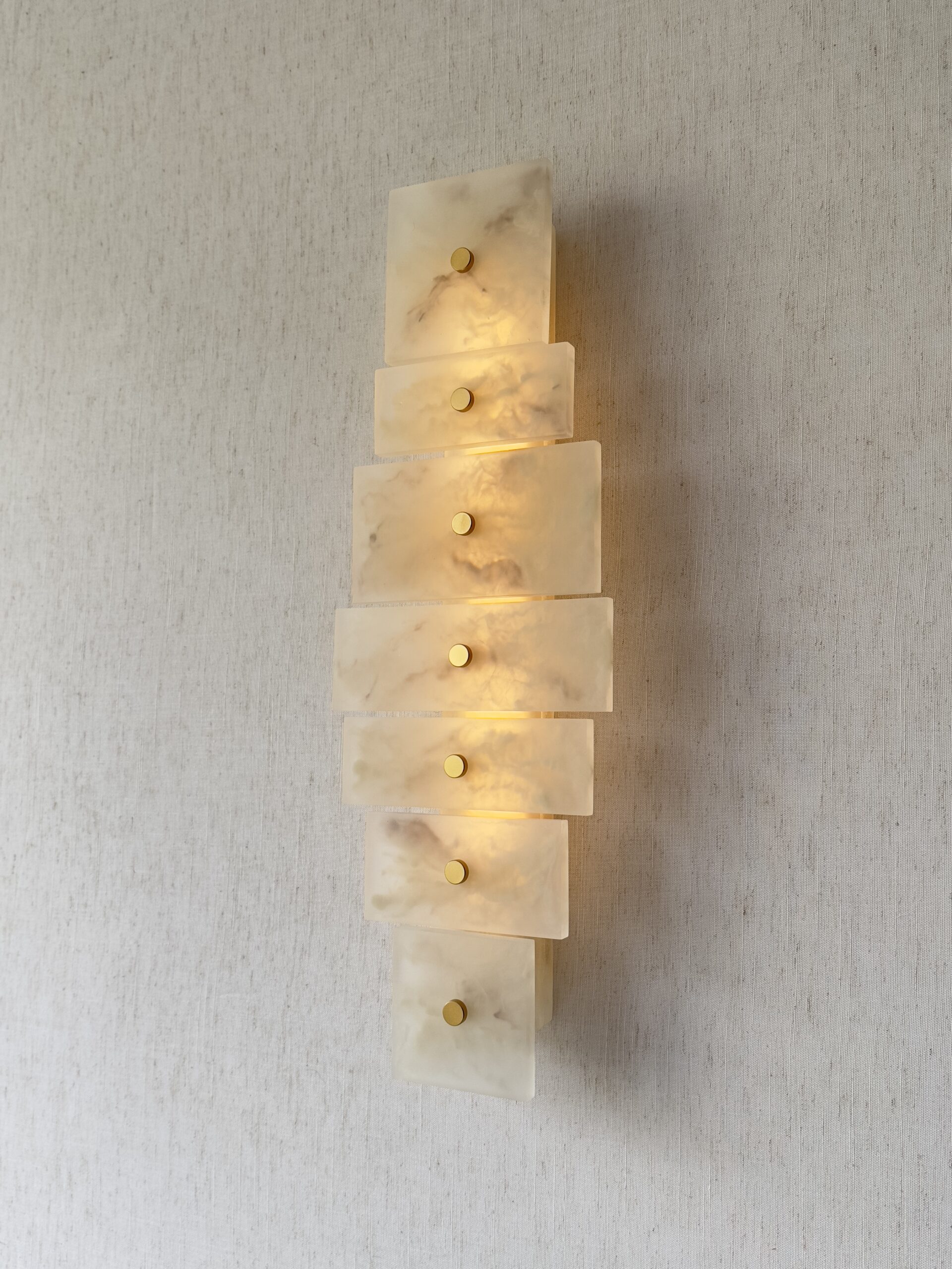 Handmade wireless resin wall sconce with alabaster-inspired finish