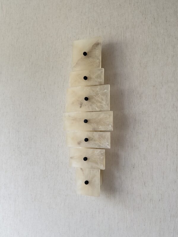 Handmade wireless resin wall sconce with alabaster-inspired finish