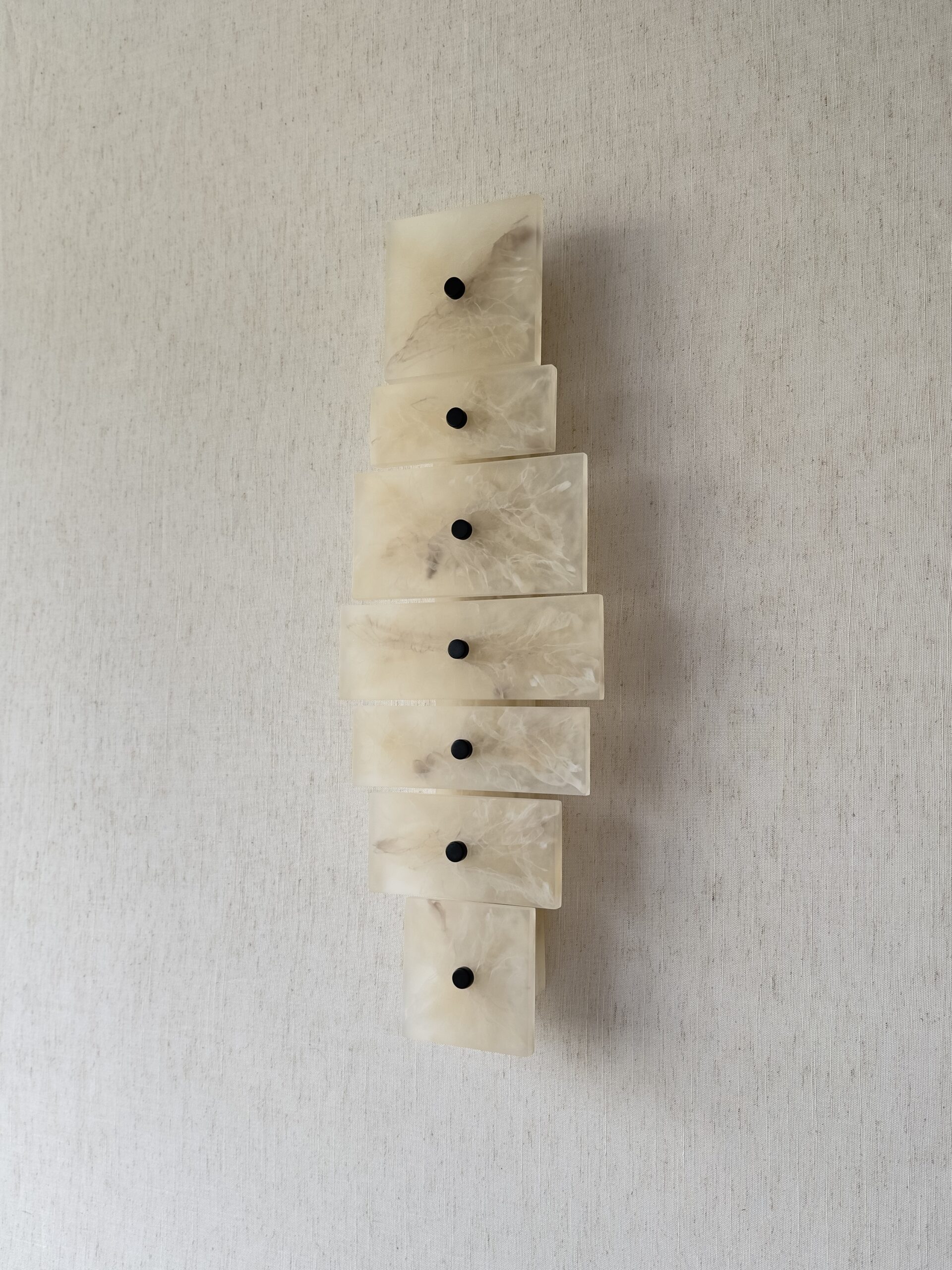 Handmade wireless resin wall sconce with alabaster-inspired finish