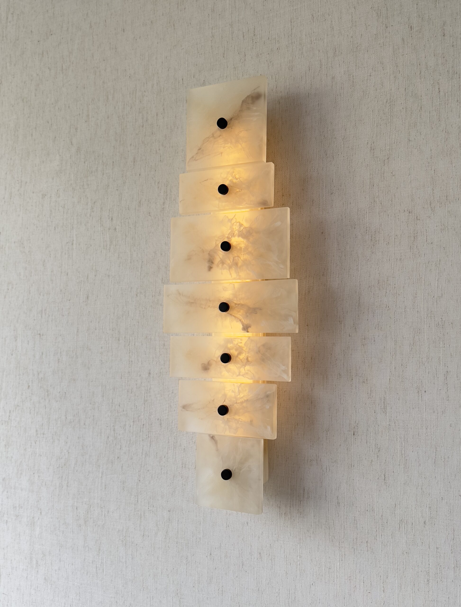 Handmade wireless resin wall sconce with alabaster-inspired finish