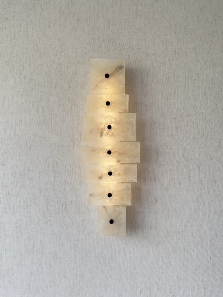 Handmade wireless resin wall sconce with alabaster-inspired finish