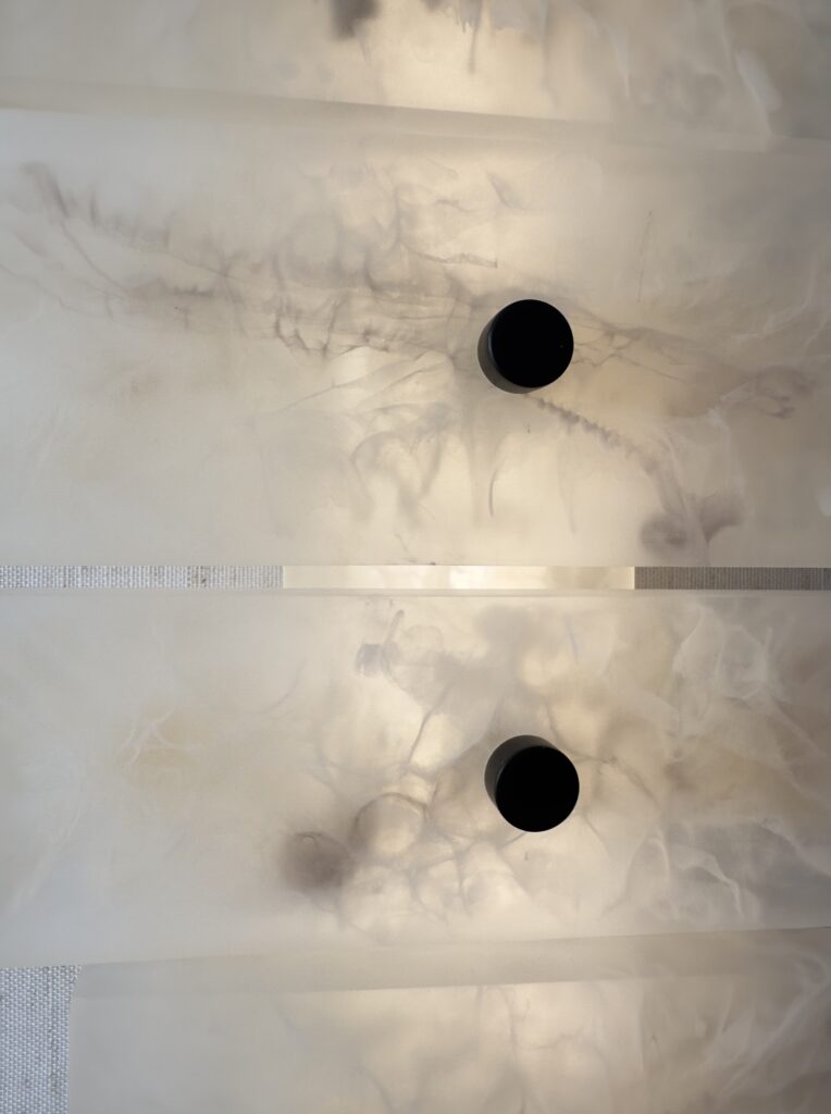 Handmade wireless resin wall sconce with alabaster-inspired finish