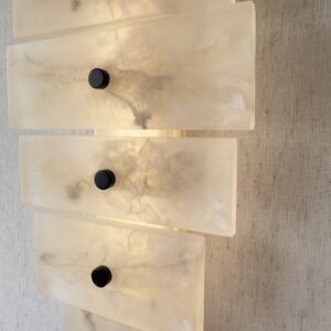 Handmade wireless resin wall sconce with alabaster-inspired finish