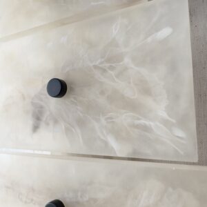 Handmade wireless resin wall sconce with alabaster-inspired finish