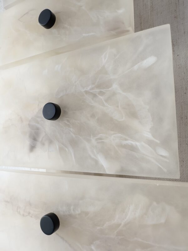 Handmade wireless resin wall sconce with alabaster-inspired finish
