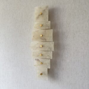 Handmade wireless resin wall sconce with alabaster-inspired finish