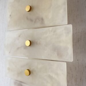 Handmade wireless resin wall sconce with alabaster-inspired finish