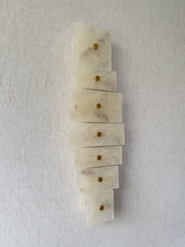 Handmade wireless resin wall sconce with alabaster-inspired finish