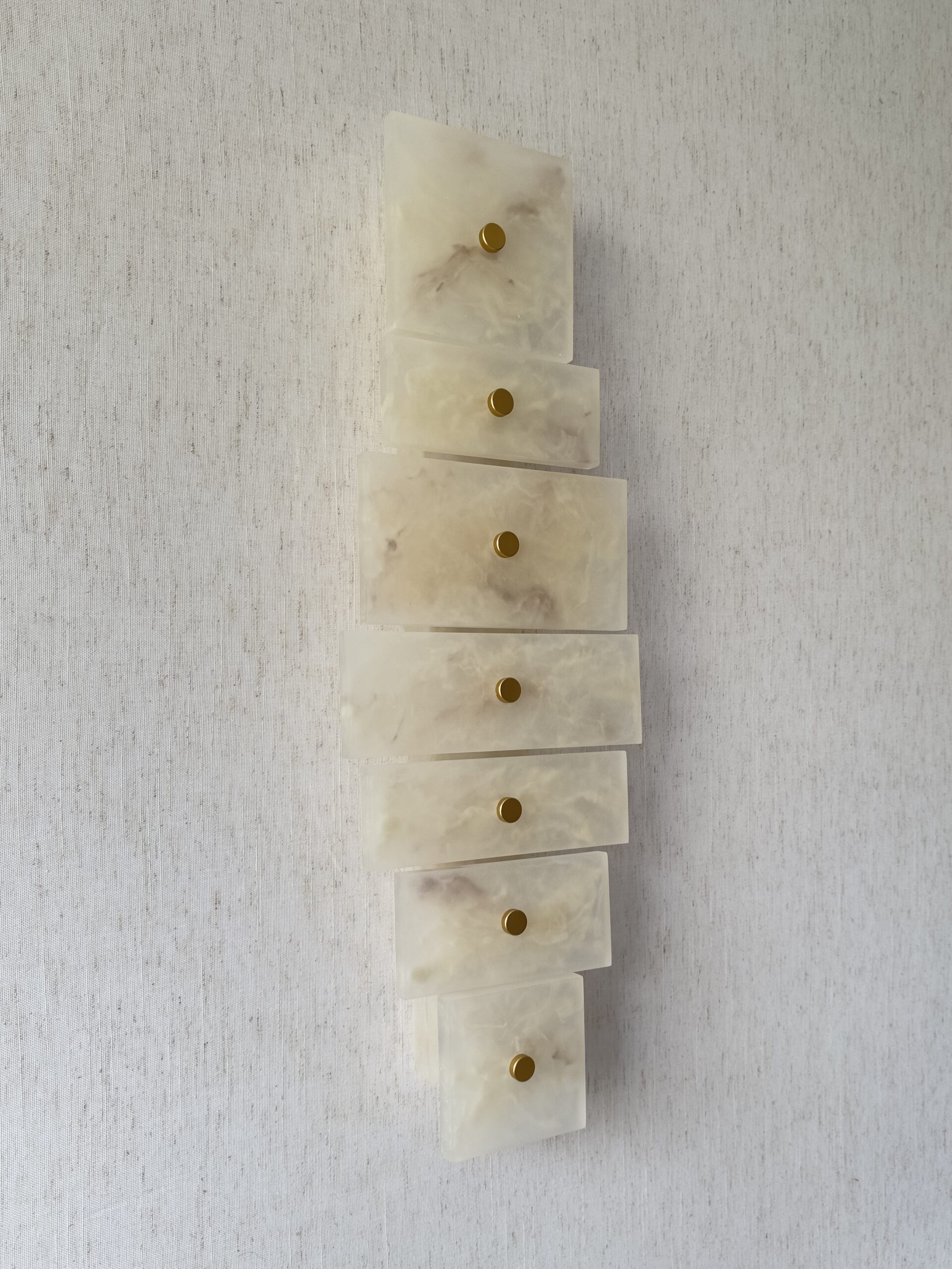 Handmade wireless resin wall sconce with alabaster-inspired finish