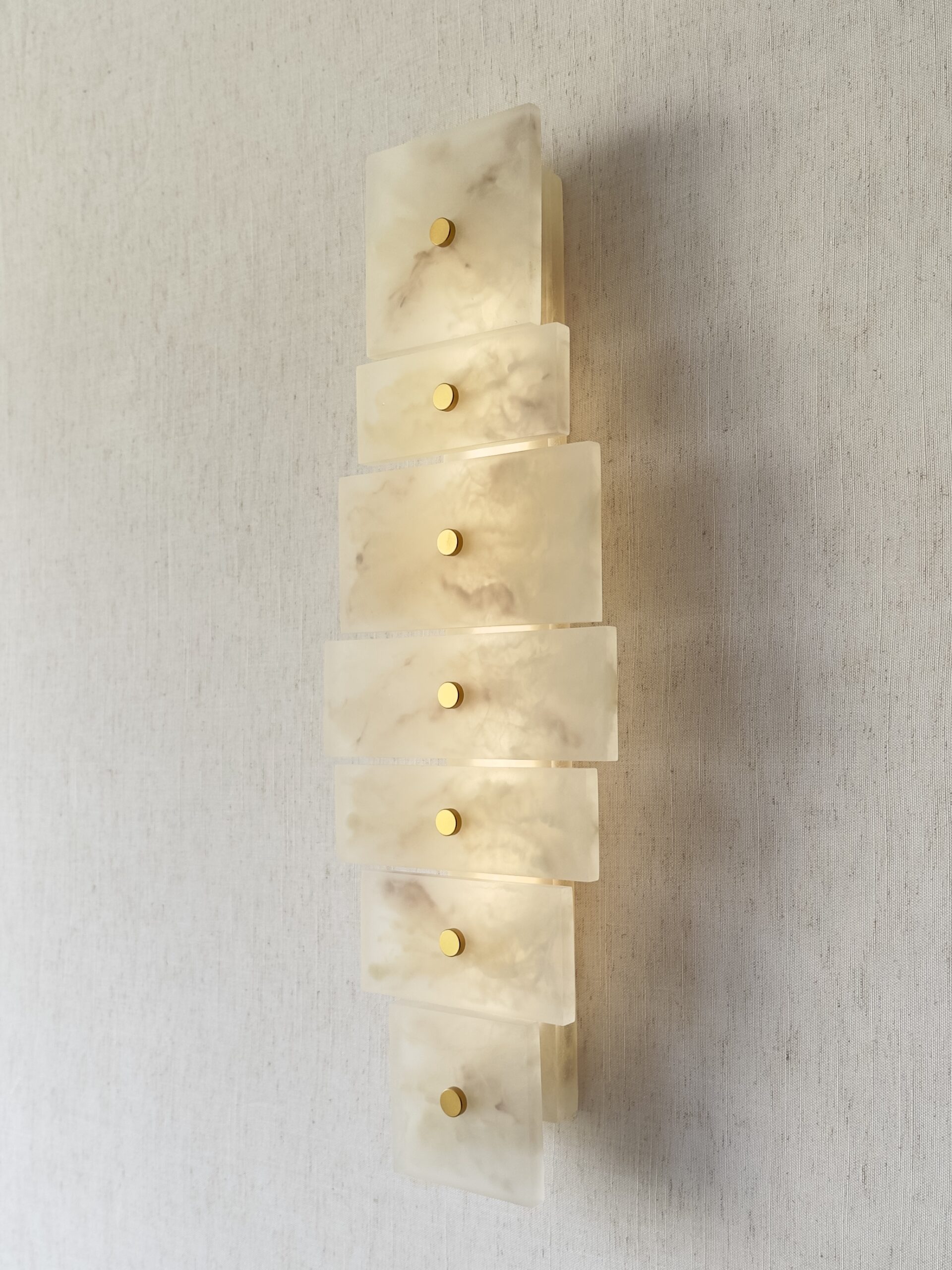 Handmade wireless resin wall sconce with alabaster-inspired finish
