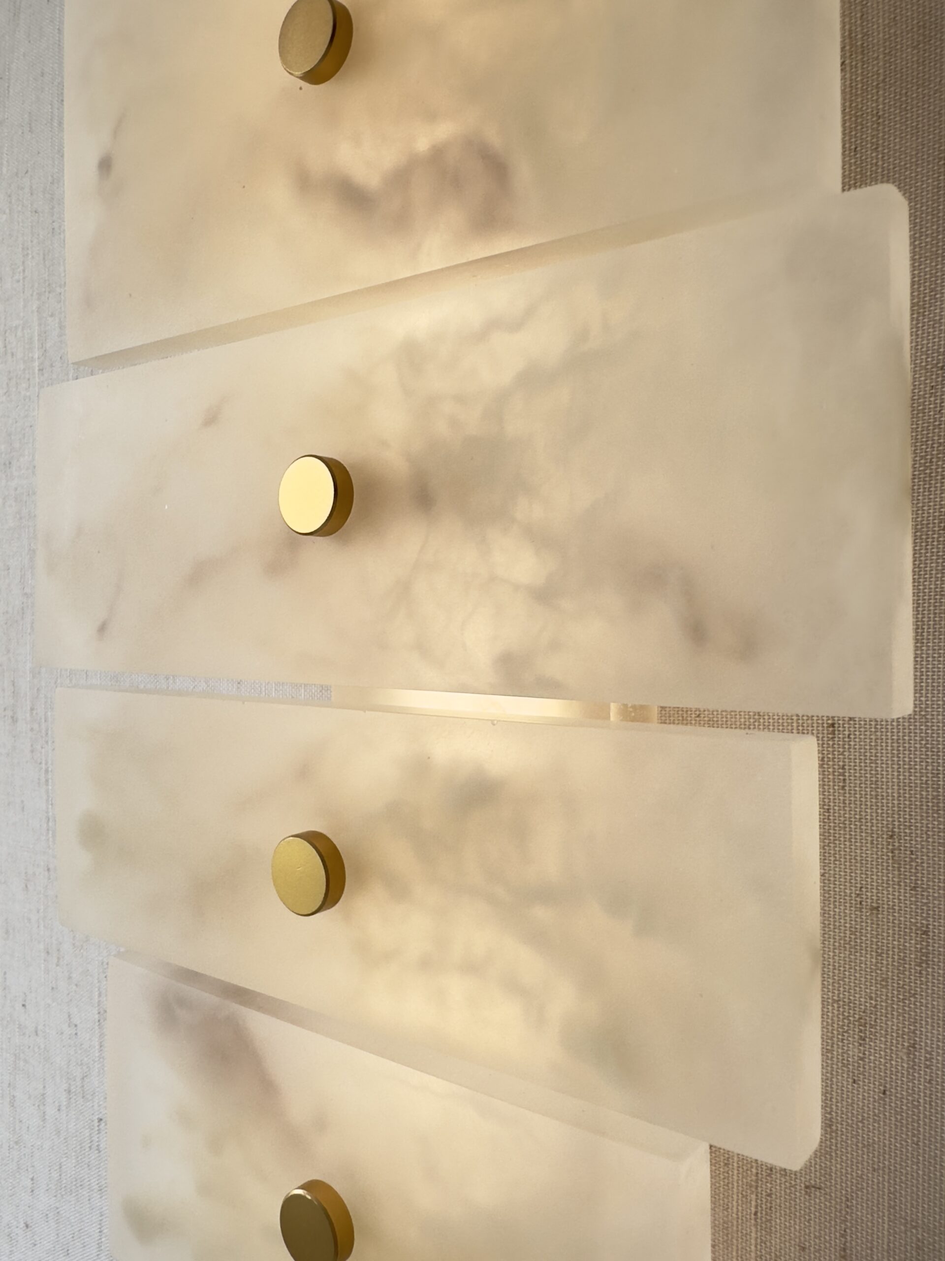 Handmade wireless resin wall sconce with alabaster-inspired finish