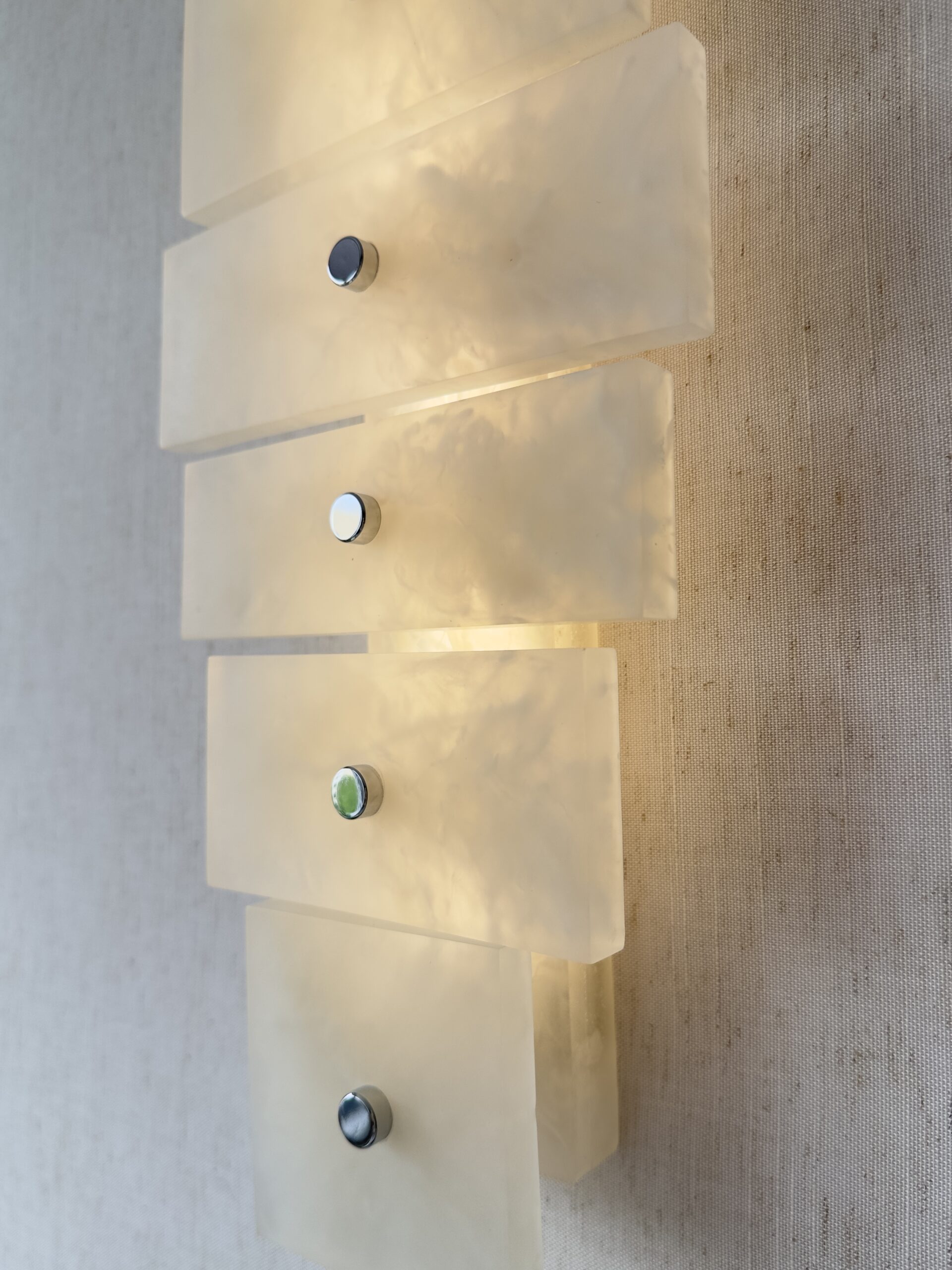 Handmade wireless resin wall sconce with alabaster-inspired finish