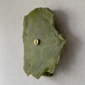 Wireless resin wall sconce inspired by green onyx stone